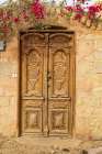 Faiyum-Egypt Wooden door in a wall Art Print